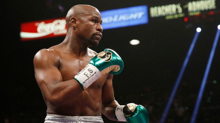 Floyd Mayweather Jr. fights Andre Berto (not shown)