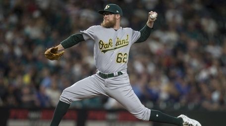 Reliever Sean Doolittle of the Oakland Athletics delivers