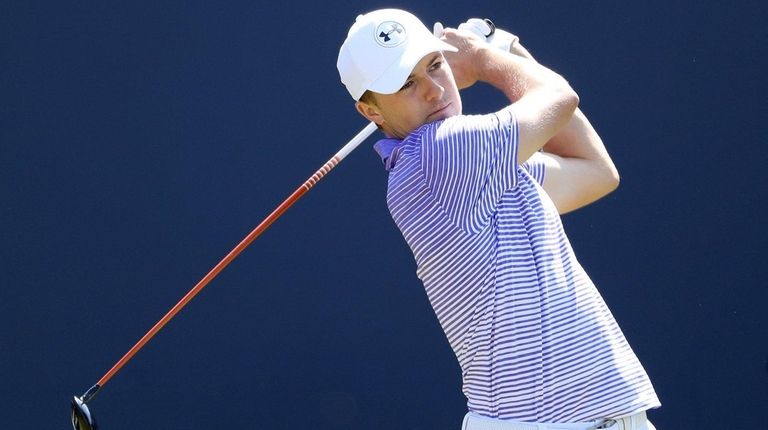 Jordan Spieth hits his tee shot on the first