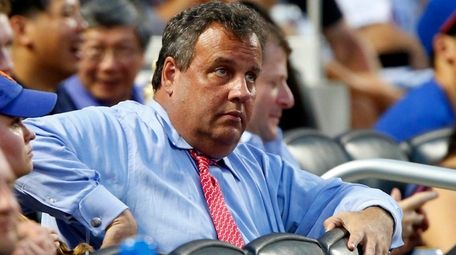 New Jersey Governor Chris Christie attends a game