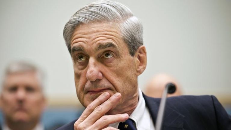 Robert Mueller listens as he testifies on Capitol
