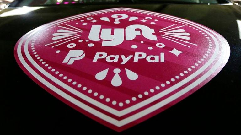 In this March 31, 2016, a Lyft ride-hailing