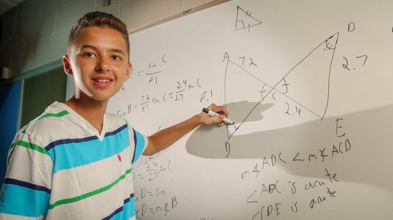 Benjamin Catalfo, 16, of East Setauket, demonstrates