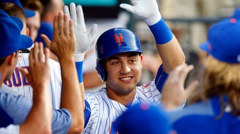 Michael Conforto of the Mets celebrates his home run