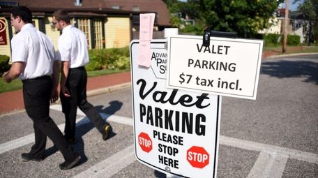 Port Jefferson has brought in valet parking attendants,