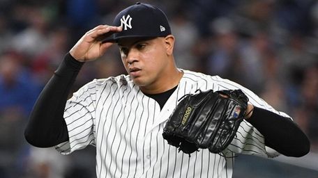 Yankees reliever Dellin Betances reacts against the Reds