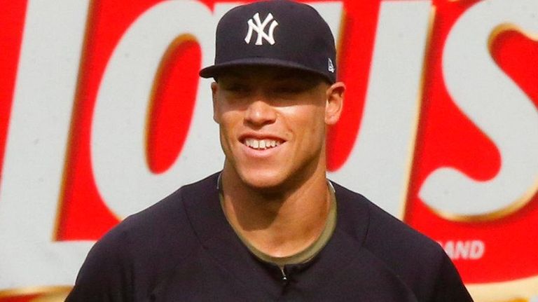 Aaron Judge of the Yankees looks on against