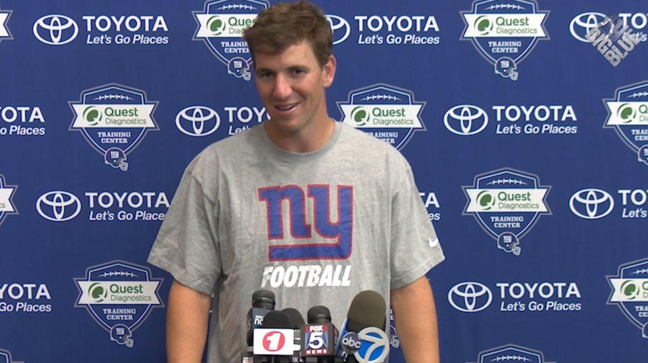 Giants quarterback Eli Manning met with the media