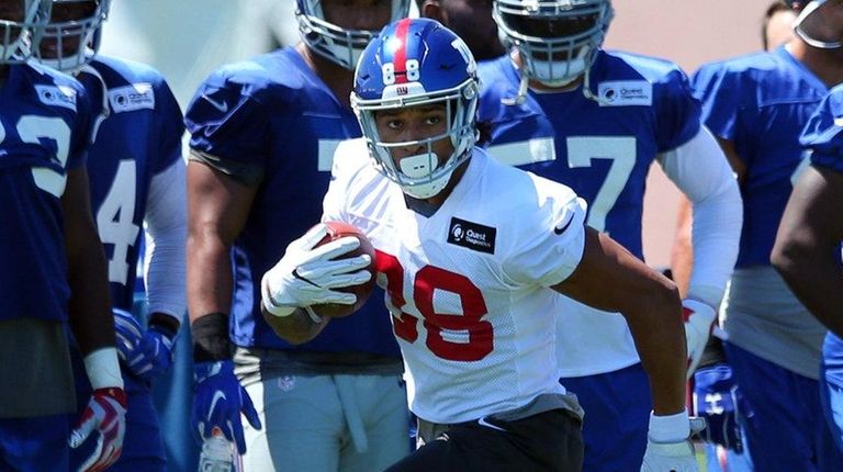 Giants tight end Evan Engram runs with the