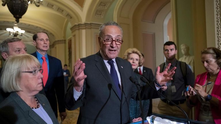 Senate Minority Leader Chuck Schumer (D-N.Y.), with, from