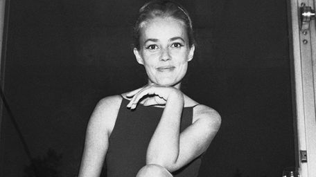 French film actress Jeanne Moreau poses for a