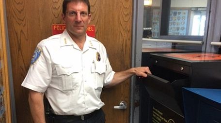 Northport Police Chief Bill Ricca shows a new