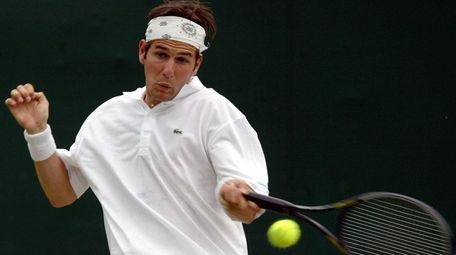 France's Jerome Golmard plays the first round match