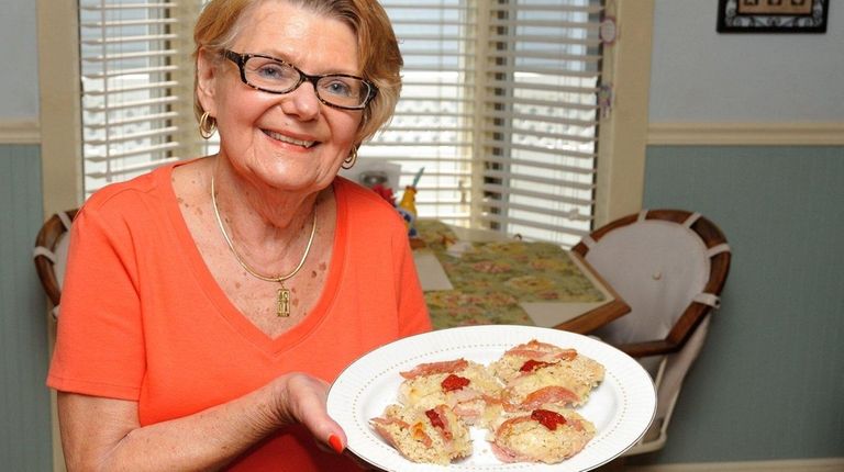 Marian Ango of Baldwin with her Chicken Sandy