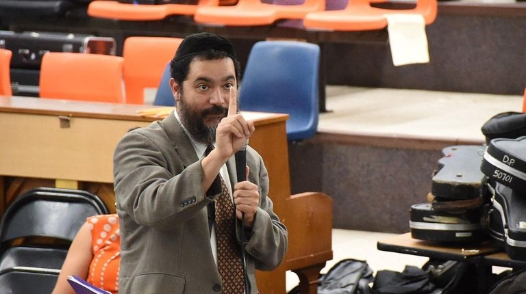 Hempstead schools Superintendent Shimon Waronker speaks during a