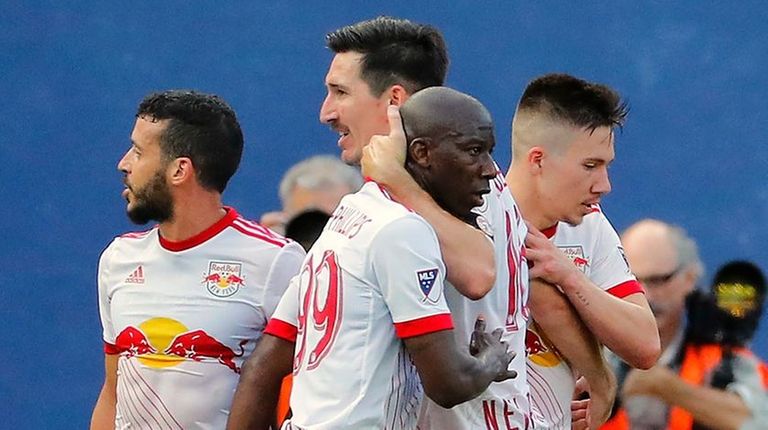 Bradley Wright-Phillips of the Red Bulls is congratulated