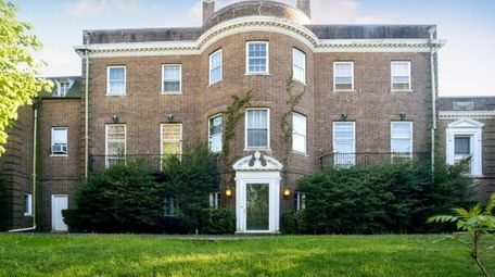 The eight-bedroom home with five full baths and