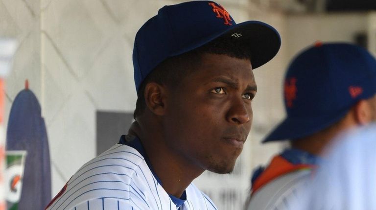Mets pitcher Rafael Montero looks on from the