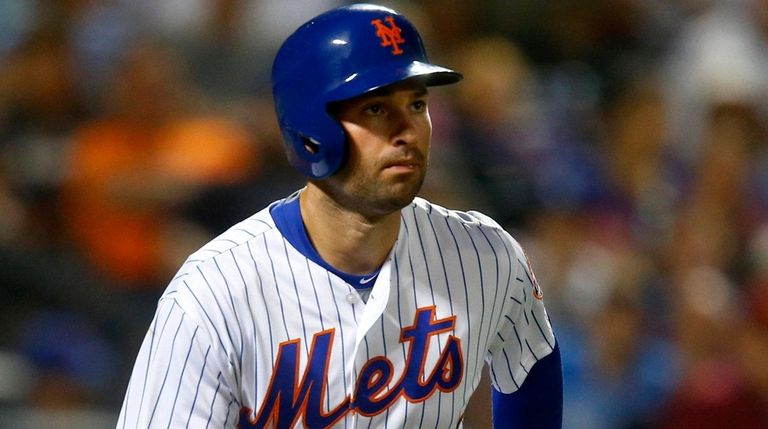 Neil Walker of the Mets grounds out against