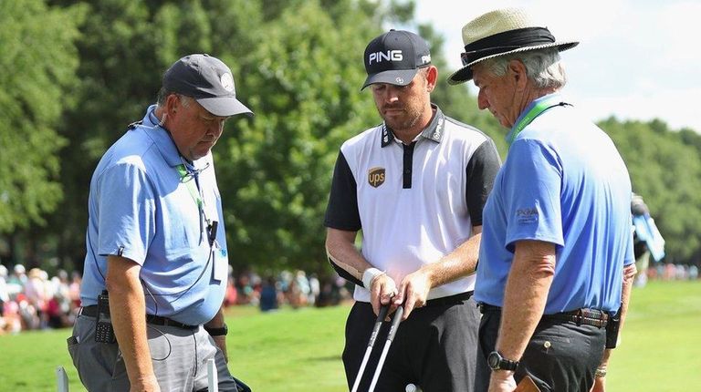 Louis Oosthuizen seeks a ruling for his bent