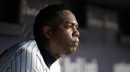New York Yankees relief pitcher Aroldis Chapman sits