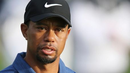 Tiger Woods reacts on the 10th hole during