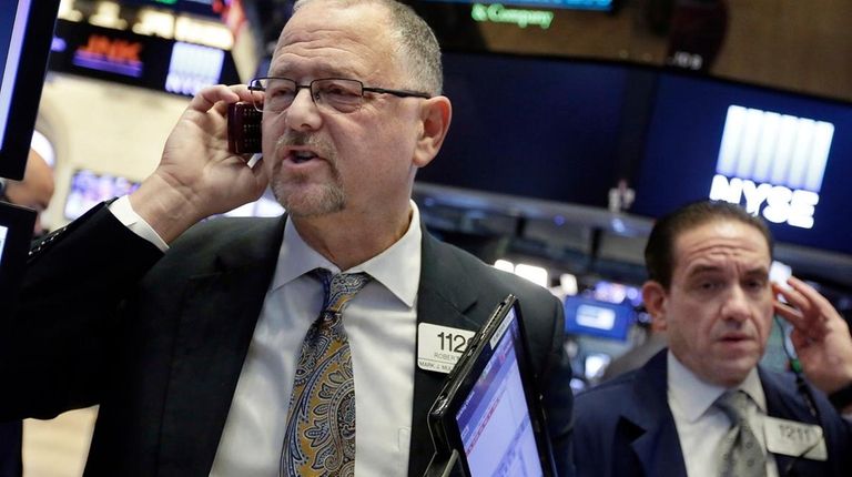 Traders Robert Moran, left, and Tommy Kalikas on
