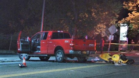 Suffolk County police respond to a crash on