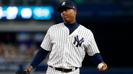 Aroldis Chapman of the Yankees grimaces at first