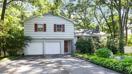 This Greenlawn split-level, listed for $587,000, includes a