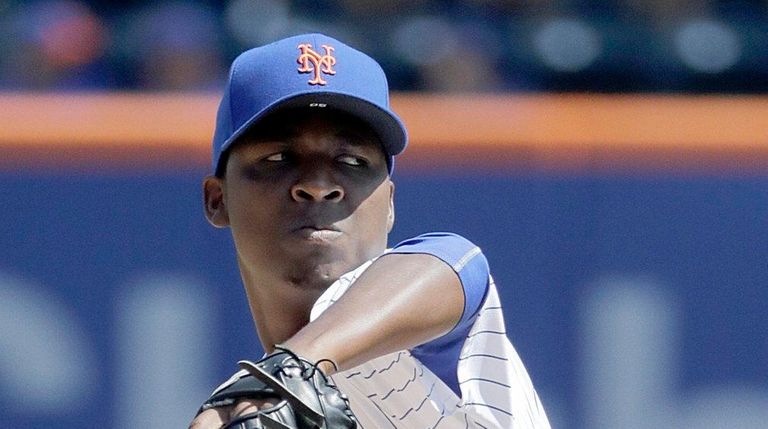 Mets starting pitcher Rafael Montero delivers during the
