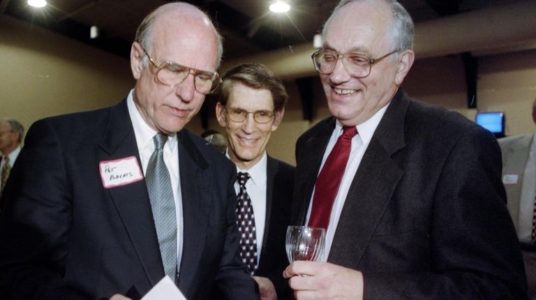Lew Ferguson, right, talks with Sen. Pat Roberts