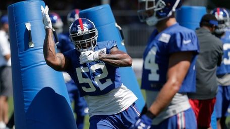 New York Giants' Jonathan Casillas participates in defensive