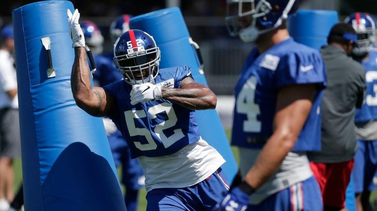 New York Giants' Jonathan Casillas participates in defensive