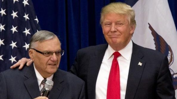 Then-Republican presidential candidate Donald Trump is joined by