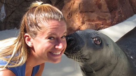 Caroline Walsh, a mammal trainer at Riverhead's Long