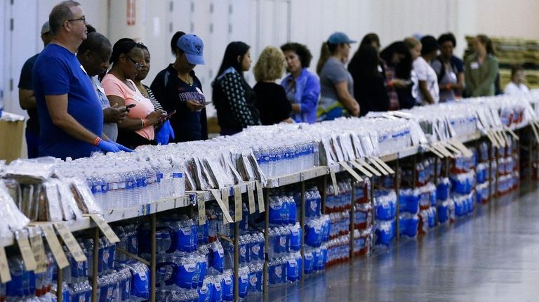 Volunteers get ready to help at a food