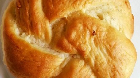 Artisan Kaiser features hand-knotted kaiser rolls baked on