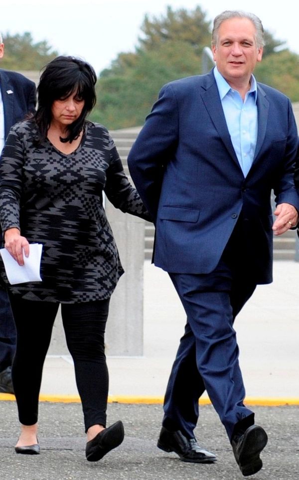 Linda Mangano and Edward Mangano, outside federal court