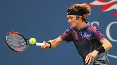 Andrey Rublev of Russia returns a shot against