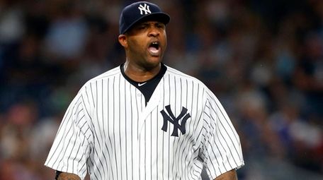 CC Sabathia of the Yankees reacts after an inning-ending double play