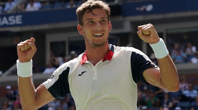 Pablo Carreno Busta celebrates match point against Diego