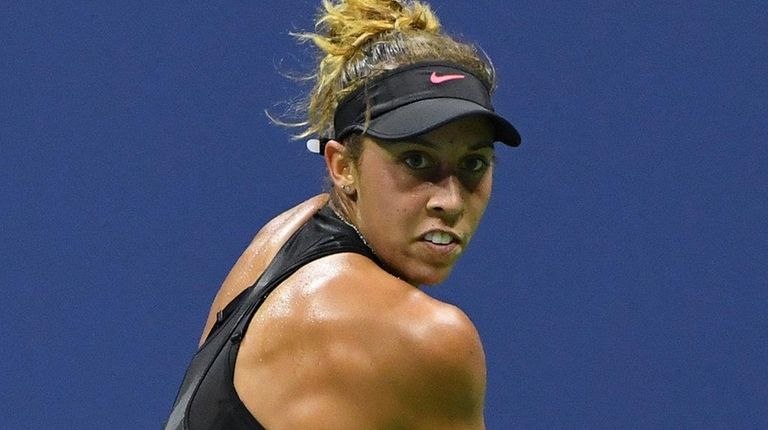 Madison Keys returns a shot to Elina Svitolina