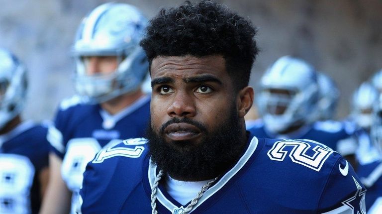 Ezekiel Elliott of the Cowboys looks on prior