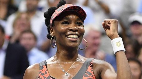 Venus Williams reacts after beating Petra Kvitova at
