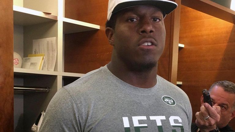 Defensive end Kony Ealy speaks in tge locker