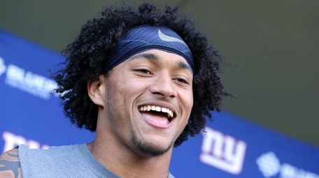 Giants tight end Evan Engram speaks with the