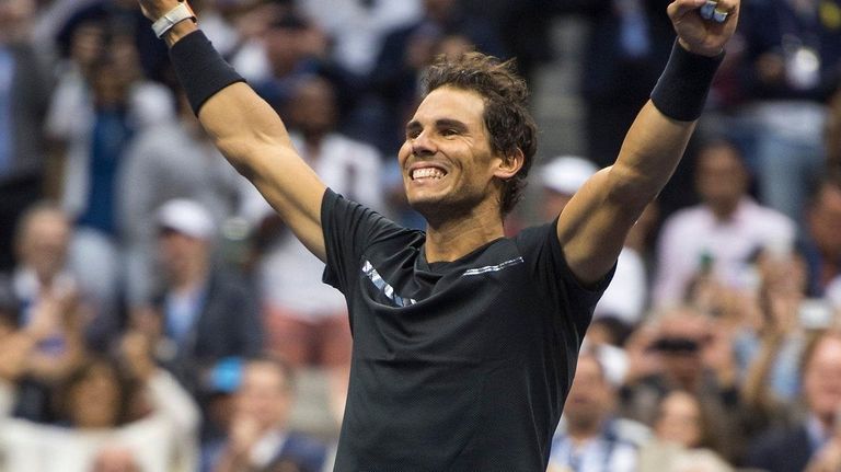 Rafael Nadal reacts after defeating Kevin Anderson in the