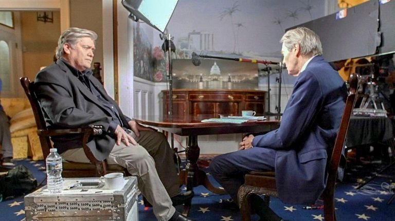 Steve Bannon, left, talks to Charlie Rose on