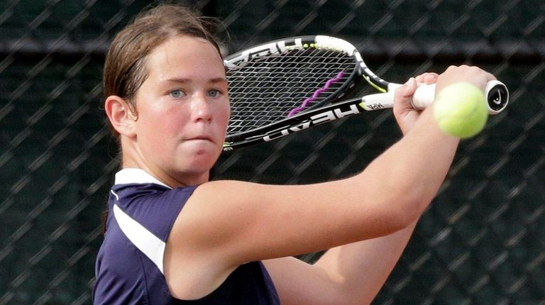 Eastport-South Manor's Jackie Bukzin makes a backhand return